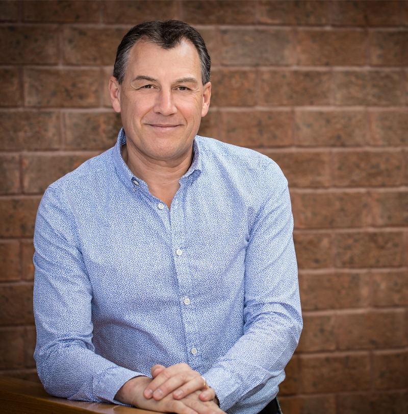 Professional headshot of David Flower, President and CEO of Volt Active Data.