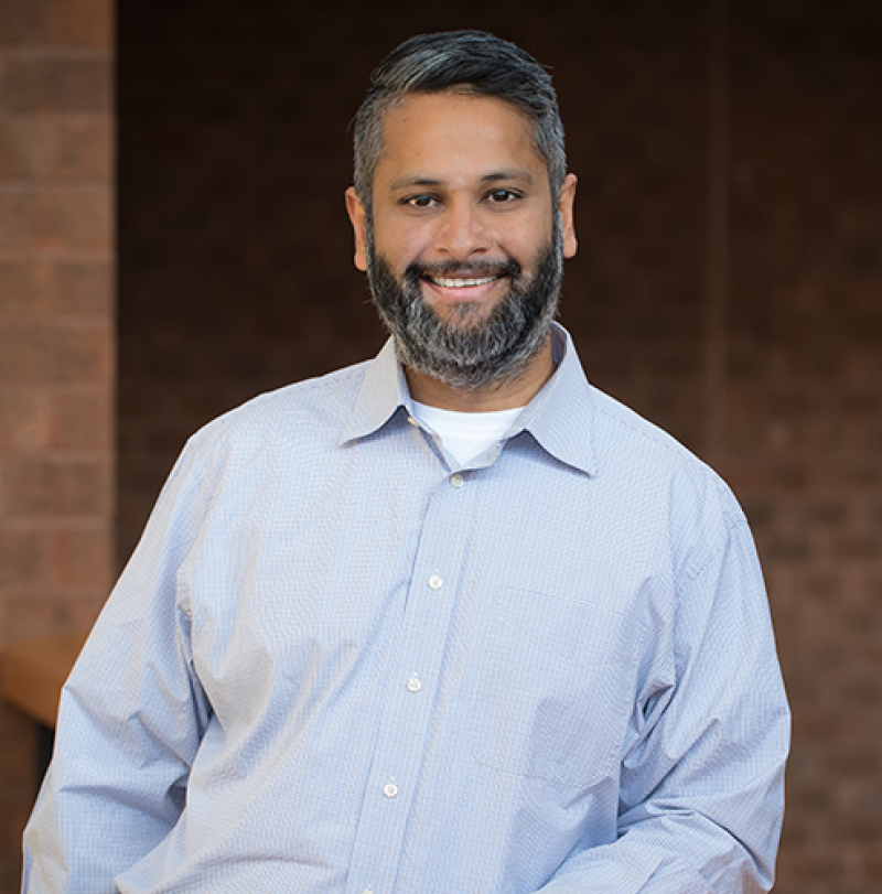 Professional headshot of Dheeraj Remella, Field Chief Technology Officer at Volt Active Data.